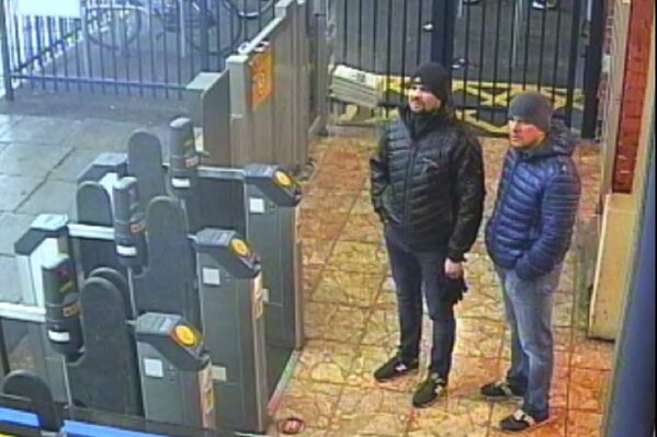 
              This still taken from CCTV and issued by the Metropolitan Police in London on Wednesday Sept. 5, 2018, shows Ruslan Boshirov and Alexander Petrov at Salisbury train station on March 3, 2018. British prosecutors have charged two Russian men, Alexander Petrov and Ruslan Boshirov, with the nerve agent poisoning of ex-spy Sergei Skripal and his daughter Yulia in the English city of Salisbury. They are charged in absentia with conspiracy to murder, attempted murder and use of the nerve agent Novichok. (Metropolitan Police via AP)
            