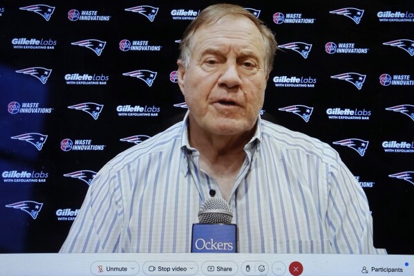 In a still frame from a Webex video news conference, in Foxborough, Mass., New England Patriots head coach Bill Belichick takes questions from reporters, Monday, Jan. 8, 2024. Belichick is open to letting someone else handle personnel duties if he remains with the New England Patriots. The Patriots head coach also confirmed Monday during his season-ending news conference that he remains under contract, though he didn't specify the length of its current terms. (AP Photo/Steven Senne)