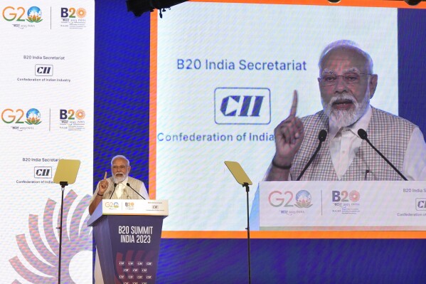 Indian Prime Minister Narendra Modi speaks at a special session of the Business 20 or B20 Summit ahead of the G20 Summit to be held in September, in New Delhi, India, Sunday, Aug. 27, 2023. The B20 is the official G20 dialogue forum with the global business community, which aims to deliver concrete actionable policy recommendations on priorities by each rotating presidency to spur economic growth and development. (AP Photo/Manish Swarup)