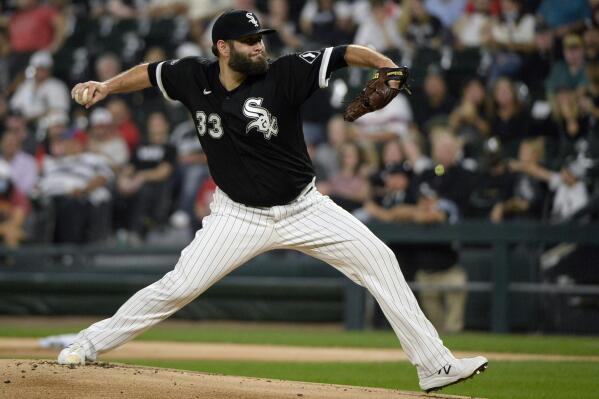 FILE - Chicago White Sox starting pitcher Lance Lynn delivers during the first inning of a baseball game against the Detroit Tigers on Oct. 1, 2021, in Chicago. Lynn was pulled from his final spring training start Saturday night, April 2, with right knee discomfort. Lynn limped off the field after a pitch during the fourth inning against Arizona. (AP Photo/Matt Marton, File)