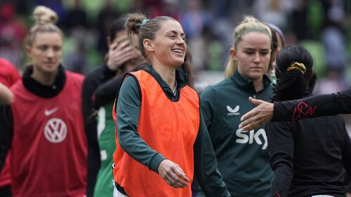 FILE - Republic of Ireland's Sinead Farrelly, center, greets players after the team's match with the United States in an international friendly soccer match in Austin, Texas, Saturday, April 8, 2023. (AP Photo/Eric Gay, File)