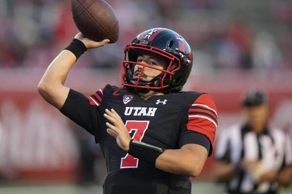 Utah quarterback Cameron Rising (7) warms up before the start of their NCAA college football game against San Diego State, Saturday, Sept. 17, 2022, in Salt Lake City. (AP Photo/Rick Bowmer)