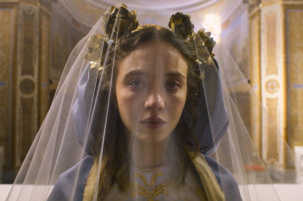 This image released by Neon shows Sydney Sweeney in a scene from the film "Immaculate." (Neon via AP)