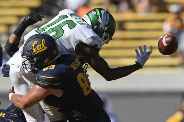 California's Evan Weaver (89) tackles North Texas' Jyaire Shorter (16) while attempting to catch a pass on fourth down in the fourth quarter of on NCAA college football game, in Berkeley, Calif., on Saturday, Sept. 14, 2019. (Jose Carlos Fajardo/San Jose Mercury News via AP)