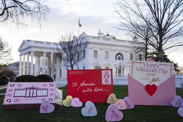 Decorations for Valentine's Day adorn the White House lawn, Wednesday, Feb. 14, 2024, in Washington. (AP Photo/Evan Vucci)