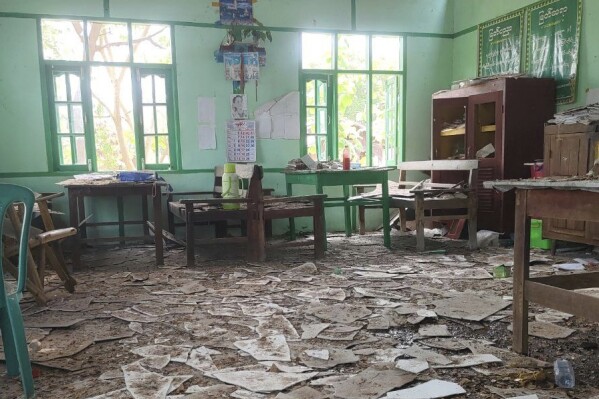 A room of a high school is seen filled with debris after it was allegedly hit by an airstrike by the military in Ohe Htein Twin village in Tabayin township, also known as Depayin in Sagaing region, Myanmar, Monday, May 12, 2025. (White Depeyin People Defence Force via AP)