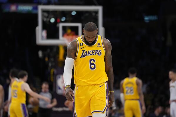 Los Angeles Lakers forward LeBron James looks down in the closing minutes of a loss to the Denver Nuggets in the second half of Game 4 of the NBA basketball Western Conference Final series Monday, May 22, 2023, in Los Angeles. (AP Photo/Ashley Landis)