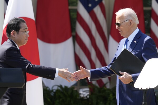 President Joe Biden and Japanese Prime Minister Fumio Kishida shake hands after holding a joint news conference in the Rose Garden of the White House, Wednesday, April 10, 2024, in Washington. (AP Photo/Alex Brandon)