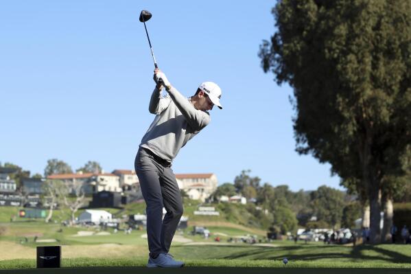 Joaquin Niemann, of Chile, tees off on the ninth hole during the second round of the Genesis Invitational golf tournament at Riviera Country Club, Friday, Feb. 18, 2022, in the Pacific Palisades area of Los Angeles. (AP Photo/Ryan Kang)