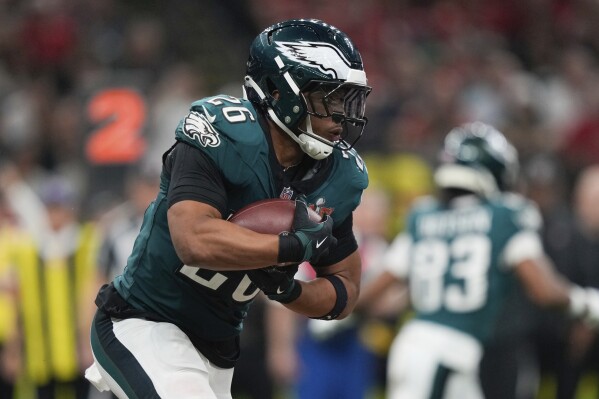 Philadelphia Eagles running back Saquon Barkley (26) carries during the second half of the NFL Super Bowl 59 football game against the Kansas City Chiefs, Sunday, Feb. 9, 2025, in New Orleans. (AP Photo/Matt Slocum)