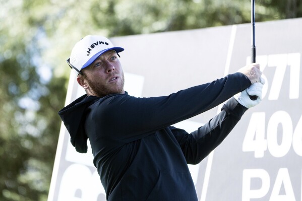 Talor Gooch, of Smash GC, hits from the third tee during the final round of LIV Golf Las Vegas at Las Vegas Country Club, Saturday, Feb. 10, 2024, in Las Vegas. (Mike Stobe/LIV Golf via AP)