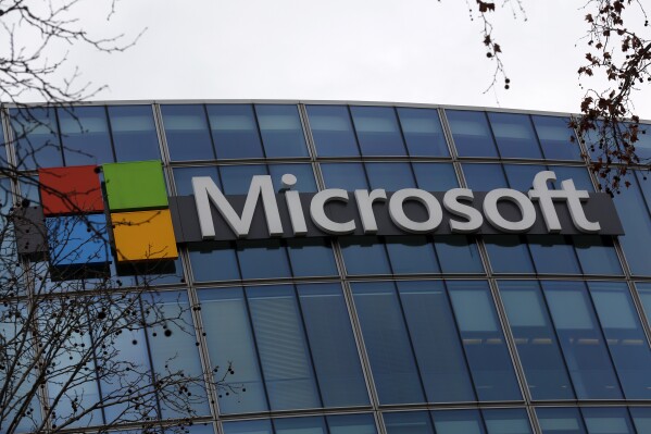 FILE - The logo of Microsoft is displayed outside the headquarters in Paris, Friday, Jan. 8, 2021. Microsoft reports their earnings on Tuesday, Jan. 30, 2024. (APPhoto/Thibault Camus, file)