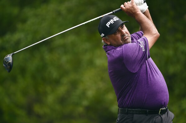 FILE - Angel Cabrera hits his tee shot on the second hole during the third round of the Houston Open golf tournament on April 1, 2017, in Humble, Texas. Argentine golfer Cabrera was released from jail on parole on Friday, Aug. 5, 2023, after he completed two years in custody over gender violence cases against two of his ex-girlfriends. (AP Photo/Eric Christian Smith, File)