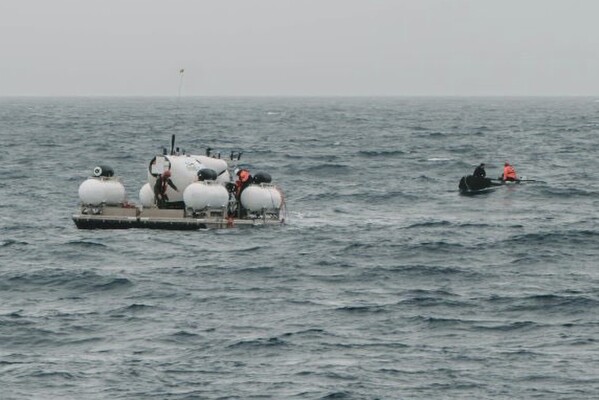 FILE - In this image released by Action Aviation, the submersible Titan is prepared for a dive into a remote area of the Atlantic Ocean on an expedition to the Titanic on Sunday, June 18, 2023. Rescuers are racing against time to find the missing submersible carrying five people, who were reported overdue Sunday night. (Action Aviation via AP, File)