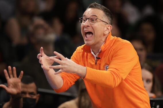 FILE - Connecticut Sun head coach Curt Miller reacts against the New York Liberty in the second half of a WNBA basketball game, Saturday, May 7, 2022, in New York. Two-time WNBA Coach of the Year Curt Miller is the new coach of the Los Angeles Sparks after seven seasons with the Connecticut Sun. Miller replaces Derek Fisher, who was fired as coach and general manager, after a 5-7 start. (AP Photo/Adam Hunger, File)