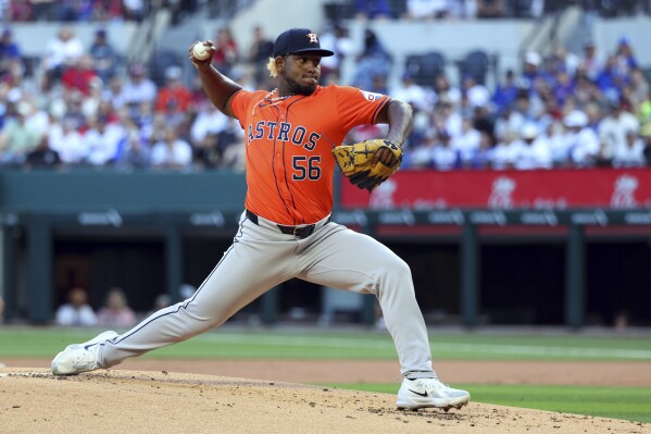 Houston Astros pitcher Ronel Blanco delivers in the second inning against the Texas Rangers in the first inning of a baseball game Sunday, April 7, 2024, in Arlington, Texas. (AP Photo/ Richard W. Rodriguez)