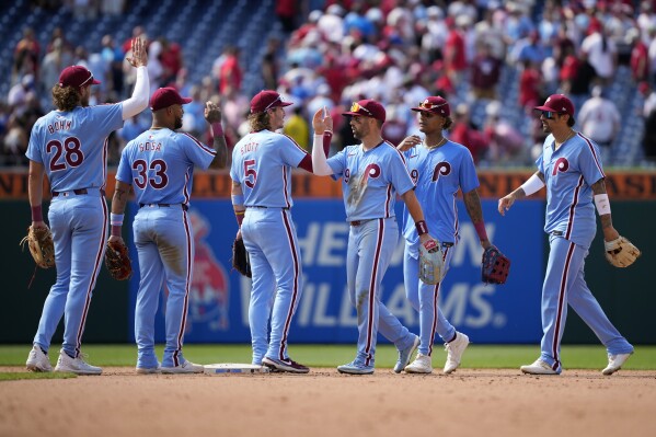 Fueled by postseason failures, the Phillies are riding high with the best record in baseball | AP News