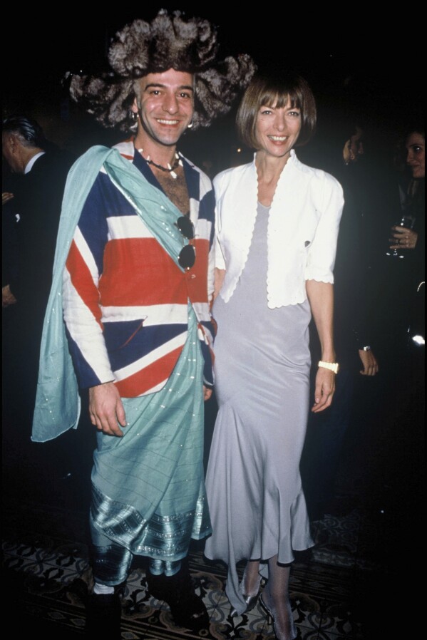 This image provided by MUBI shows fashion designer John Galliano, left, and Vogue Editor-in-Chief, Anna Wintour, from the documentary film “High & Low --John Galliano," directed by Kevin Macdonald. (Bestimage/MUBI via AP)