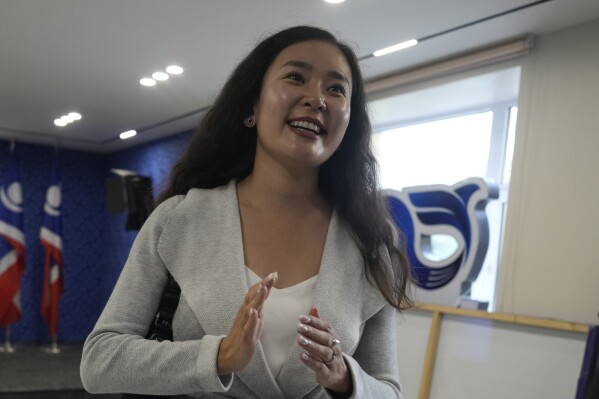 Tsenguun Saruulsaikhan, then a young candidate vying for a position in Mongolia's parliament, speaks at a party headquarters in Ulaanbaatar, Mongolia, Thursday, June 27, 2024. Tsenguun went on to become one of 42 winning candidates from the Democratic Party, the main opposition group, which made a major comeback after being reduced to a handful of seats in the 2016 and 2020 elections. (AP Photo/Ng Han Guan)