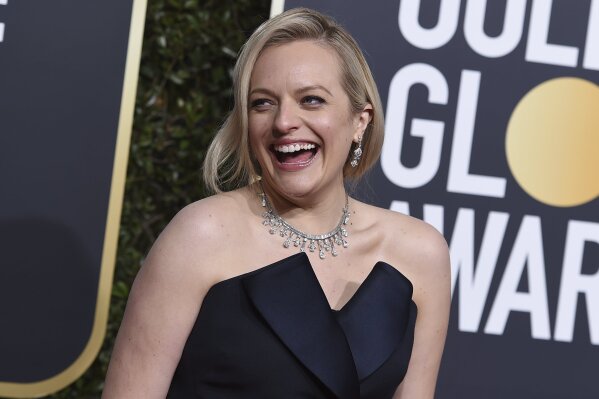 
              Elisabeth Moss arrives at the 76th annual Golden Globe Awards at the Beverly Hilton Hotel on Sunday, Jan. 6, 2019, in Beverly Hills, Calif. (Photo by Jordan Strauss/Invision/AP)
            