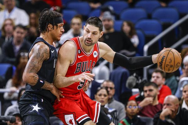 WASHINGTON, DC - JANUARY 11: Chicago Bulls center Nikola Vucevic (9)  watches as forward Patrick Williams (44) starts up court during a NBA game  between the Washington Wizards and the Chicago Bulls