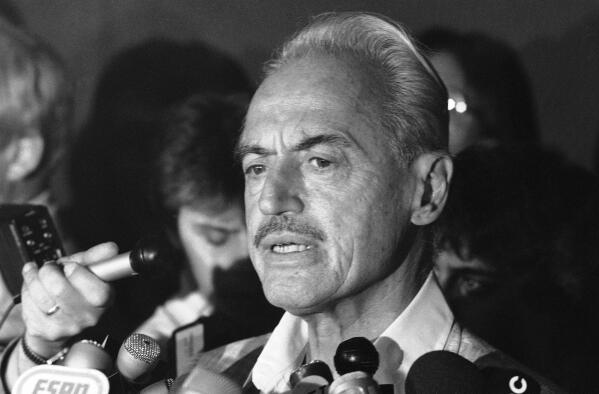 FILE - In this Thursday, July 16, 1981, file photo, Marvin Miller, executive director of the players association, speaks with newsmen at New York's Doral Inn after rejecting a new proposal attempting to end the 35-day-old Major League Baseball strike. The Baseball Hall of Fame will induct Miller on Wednesday, Sept. 8, 2021. (AP Photo/Howard, File)