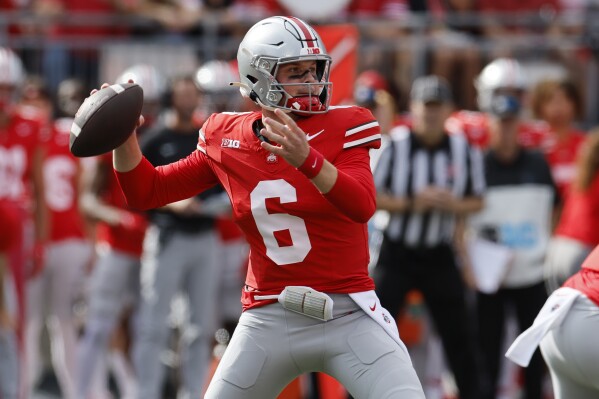 Ohio State quarterback Kyle McCord drops back to pas against Western Kentucky during the first half of an NCAA college football game, Saturday, Sept. 16, 2023, in Columbus, Ohio. (AP Photo/Jay LaPrete)