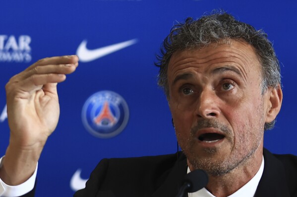 Newly named PSG coach Luis Enrique speaks during a press conference at the new Paris-Saint-Germain training ground Wednesday, July 5, 2023 in Poissy, west of Paris. Paris Saint-Germain fired coach Christophe Galtier after a disappointing season on and replaced him with former Spain and Barcelona manager Luis Enrique. (AP Photo/Aurelien Morissard)