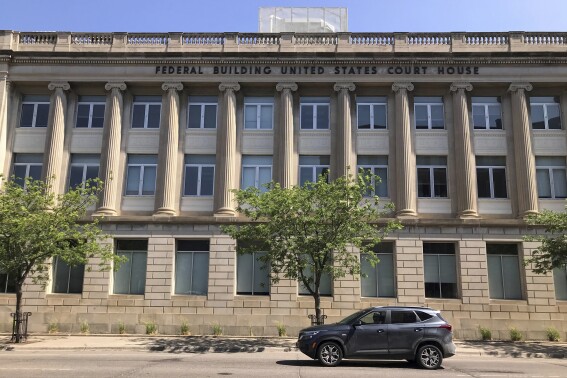 FILE - The federal courthouse stands in Fargo, N.D., June 19, 2023. On Friday, Sept. 1, two nonprofits filed suit against a white nationalist hate group in federal court, alleging the group committed racial intimidation by vandalizing Fargo-area businesses and public property, including graffiti of the group's logos. (AP Photo/Jack Dura, File)