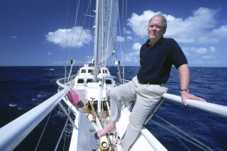 This photo provided by Ocean Alliance shows Roger Payne on board Ocean Alliance’s research vessel RV Odyssey during the Voyage of the Odyssey, a groundbreaking toxicology study circumnavigating the globe, in 2002 off of Western Australia in the Indian Ocean. Payne, the scientist who spurred a world-wide environmental conservation movement with his discovery that whales can sing, has died. He was 88. (Christopher Johnson/Ocean Alliance via AP)
