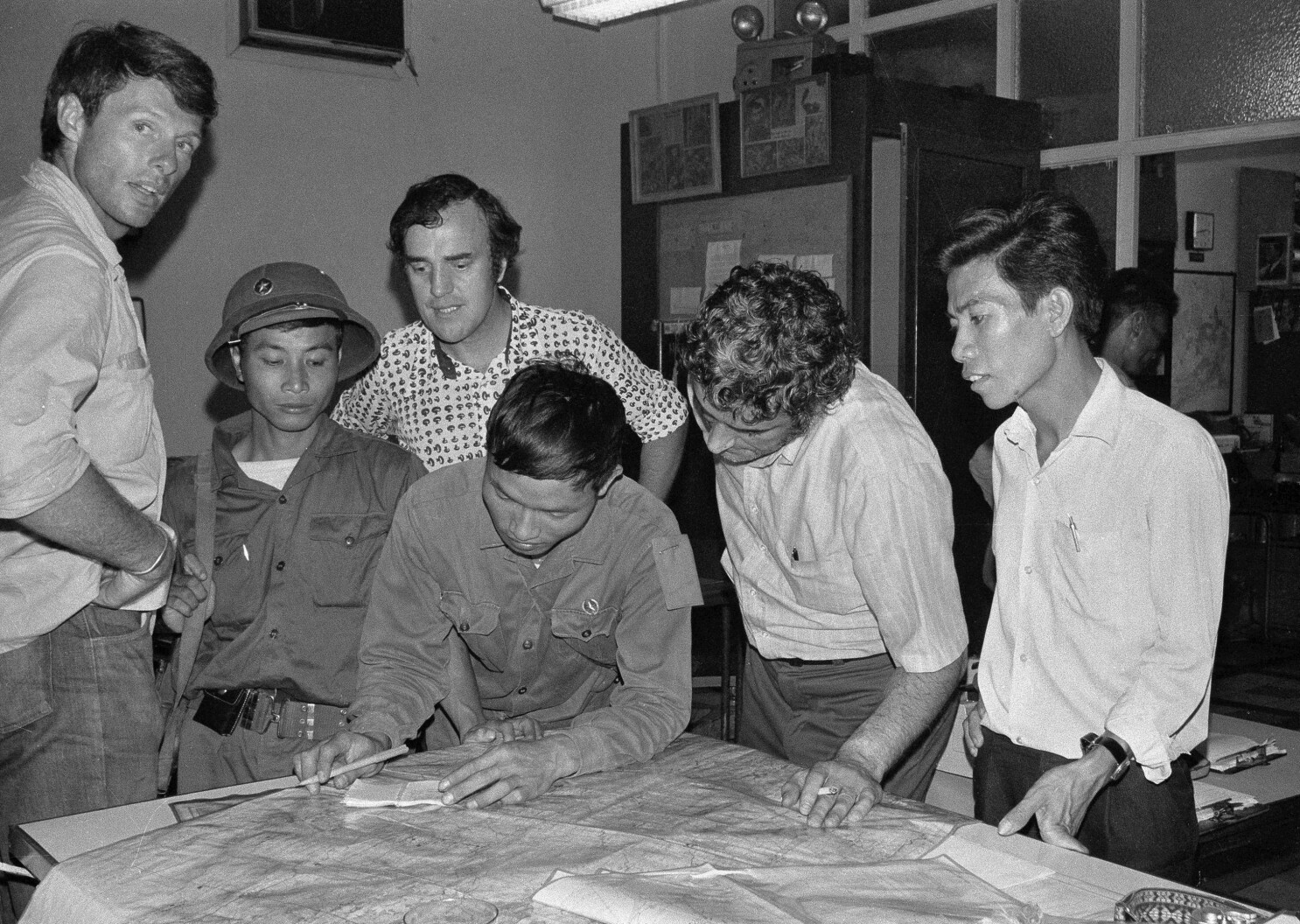 As communist troops streamed into Saigon, a few remaining reporters kept photos and stories flowing