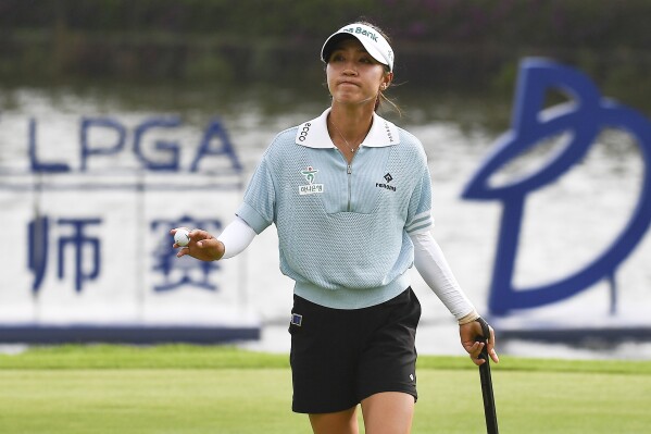 In this photo released by Xinhua News Agency, Lydia Ko of New Zealand reacts after the final round of the the Blue Bay LPGA golf tournament in Lingshui, southern China's Hainan province on Sunday, March 10, 2024. Lydia Ko, who held the lead in China with Tardy and Schmelzel after three rounds, finished with a 71, six strokes behind the winner. (Yang Guanyu/Xinhua via AP)