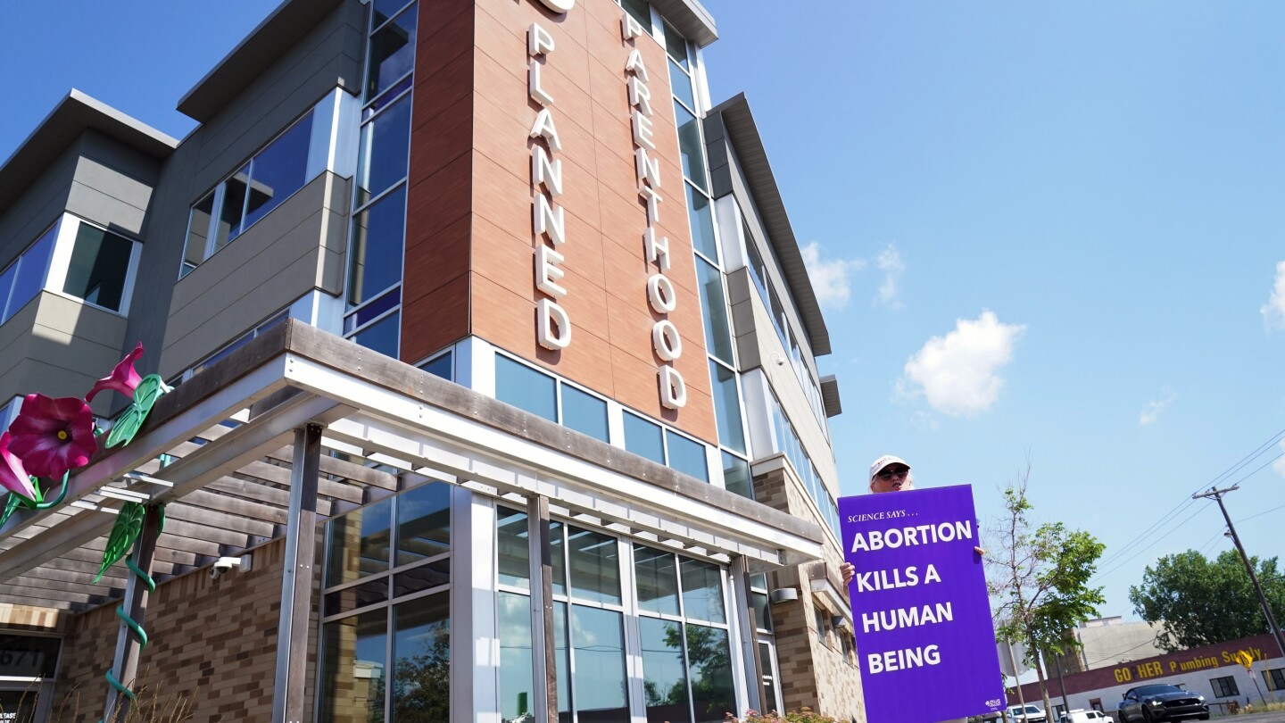 A Planned Parenthood affiliate plans to close 4 clinics in Iowa and another 4 in Minnesota