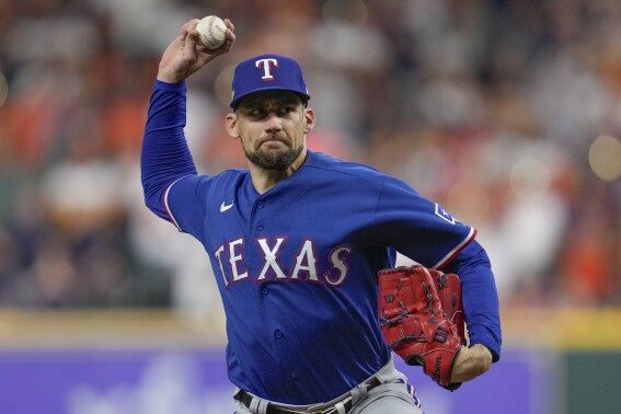 Texas Rangers starting pitcher Nathan Eovaldi thorws during the first inning of Game 6 of the baseball AL Championship Series against the Houston Astros Sunday, Oct. 22, 2023, in Houston. (AP Photo/Godofredo A. Vásquez)
