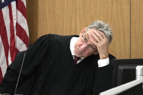 Maricopa County Superior Court Judge John Hannah listens to arguments during the second day of the two-day bench trial brought by Kari Lake, former Arizona Republican candidate for governor, regarding a voting records request, Monday, Sept. 25, 2023, in Phoenix. (AP Photo/Ross D. Franklin, Pool)