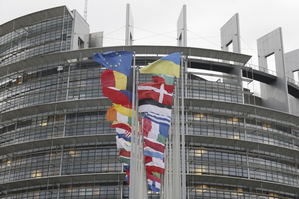 FILE - European flags fly outside the European Parliament on Feb. 7, 2024 in Strasbourg, eastern France. Some 400 million EU citizens go to the polls this weekend to elect the members of the European Parliament in one of the biggest global democratic events. (AP Photo/Jean-Francois Badias, File)