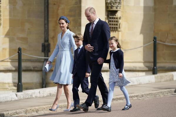 Britain’s Prince William and Kate, Duchess of Cambridge arrive with Prince George and Princess Charlotte to the Easter Mattins Service at St George's Chapel at Windsor Castle in Berkshire, England, Sunday, April 17, 2022. (Andrew Matthews/Pool Photo via AP)