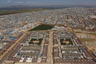 FILE - In this April 19, 2020, file photo, shows a large refugee camp on the Syrian side of the border with Turkey, near the town of Atma, in Idlib province, Syria. Russia has previewed a showdown with the United Nations, United States and Western nations Wednesday, June 23, 2021, over the delivery of humanitarian aid to rebel-held northwest Syria from Turkey. (AP Photo/Ghaith Alsayed, File)