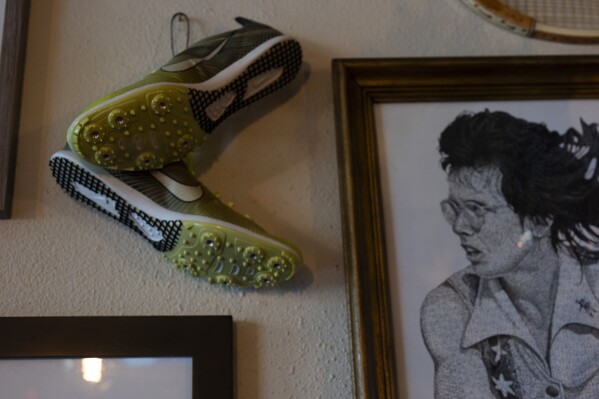 An image depicting tennis legend Billie Jean King is displayed at The Sports Bra sports bar on Thursday, April 25, 2024, in Portland, Ore. (AP Photo/Jenny Kane)