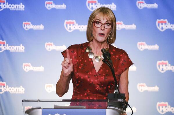 FILE - Indiana Lt. Gov. Suzanne Crouch introduces Gov. Eric Holcomb to make his re-election announcement at a campaign rally in Knightstown, Ind., Saturday, July 13, 2019. Crouch formally started her 2024 campaign for governor on Monday, Dec. 12, 2022, and said she would not shy away from Holcomb's record despite discontent among many conservatives over his COVID-19 policies and other actions. (AP Photo/AJ Mast, File)