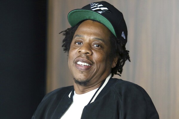 Jay-Z says lawsuit accusing him of raping a child at awards after-party is part of an extortion ploy | AP News