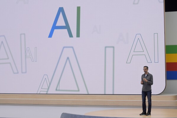 FILE - Alphabet CEO Sundar Pichai speaks at a Google I/O event in Mountain View, Calif., May 14, 2024. Bloopers — some funny, others disturbing — have been shared on social media since Google unleashed a makeover of its search page that frequently puts AI-generated summaries on top of search results. (AP Photo/Jeff Chiu, File)