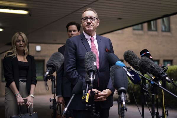 Actor Kevin Spacey addresses the media outside Southwark Crown Court in London, Wednesday, July 26, 2023. A Jury cleared Kevin Spacey of nine sex offences. The Hollywood star, 64, had been on trial at Southwark Crown Court accused of sexually assaulting four men in the period between 2001 and 2013. (AP Photo/Alberto Pezzali)