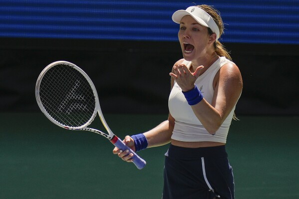 Danielle Collins, of the United States, reacts in the first set against Caroline Dolehide, of the United States, during the first round of the U.S. Open tennis championships, Tuesday, Aug. 27, 2024, in New York. (AP Photo/Seth Wenig)