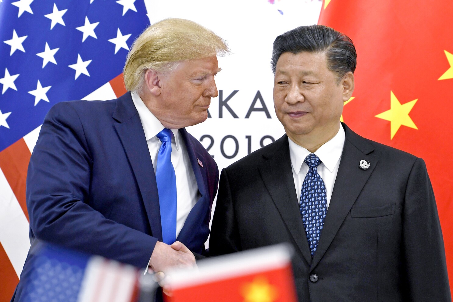 Trump appears to relax stance on China after talking tough during campaign  | AP News