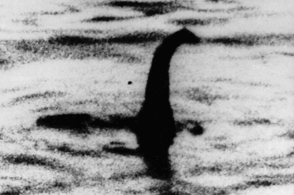 FILE - This undated file photo shows a shadowy shape that some people say is a the Loch Ness monster in Scotland, later debunked as a hoax. Mystery-hunters converged on a Scottish lake on Saturday, Aug. 26, 2023 to hunt for signs of the mythical Loch Ness Monster. The Loch Ness Center said researchers would try to seek evidence of Nessie using thermal-imaging drones, infrared cameras and a hydrophone to detect underwater sounds in the lake’s murky waters. (AP Photo/File)