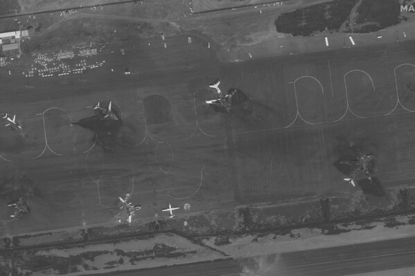 This satellite image provided by Maxar Technologies shows destroyed airplanes on the tarmac at the Sanaa International Airport in Yemen on Wednesday, May 7, 2025, after a Tuesday Israeli attack. (Maxar Technologies via AP)