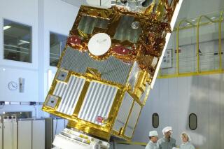 This photo provided by the European Space Agency shows the European Remote Sensing 2 satellite (ERS-2) satellite in a clean room before its launch in 1995. The Earth-observing satellite fell out of orbit Wednesday, Feb. 21, 2024, and harmlessly broke apart over the Pacific. (ESA via AP)