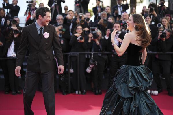 Josh O'Connor, left, and Alana Haim pose for photographers upon arrival at the premiere of the film 'The Mastermind' at the 78th international film festival, Cannes, southern France, Friday, May 23, 2025. (Photo by Scott A Garfitt/Invision/AP)