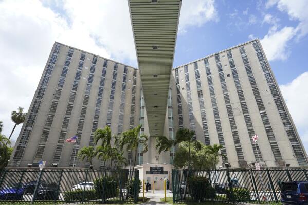 An elevated walkway leading from the Miami-Dade County Pre-Trial Detention Center to the Richard E. Gerstein Justice Building is shown, Friday, June 4, 2021, in Miami.  By the middle of 2020, the number of people in jails nationwide was at its lowest point in more than two decades, according to a new report by the Vera Institute of Justice, whose researchers collected population numbers from about half of the nation’s 3,300 jails to make national estimates. But the numbers have begun creeping back up again as courts are back in session and the world begins returning to a modified version of normal. It’s worrying criminal justice reformers who argue that the past year proved there is no need to keep so many people locked up in the U.S.  (AP Photo/Wilfredo Lee)